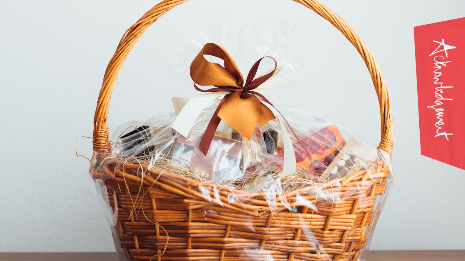 A gift hamper with a bundle of things inside