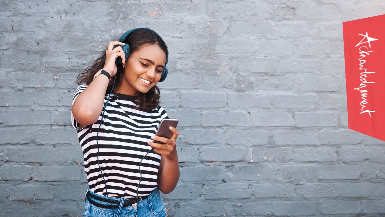 Person listening to music via their mobile phone