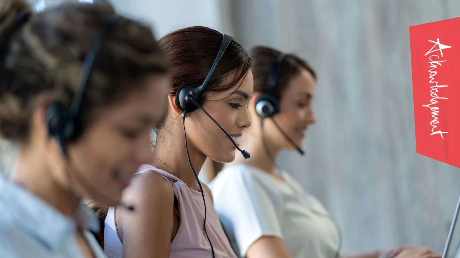 Call centre staff talking to customers